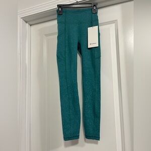 Lululemon Athletica Invigorate High-Rise Leggings in Teal-25"